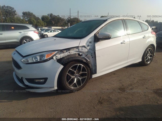 Photo 1 VIN: 1FADP3K2XGL380122 - FORD FOCUS 