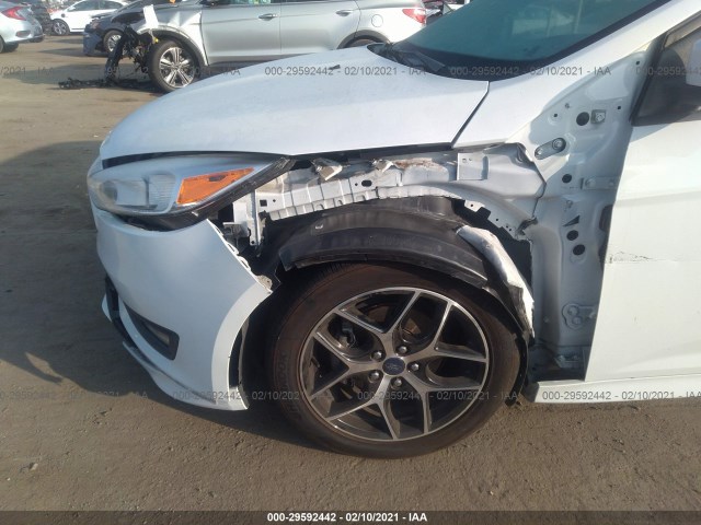 Photo 5 VIN: 1FADP3K2XGL380122 - FORD FOCUS 