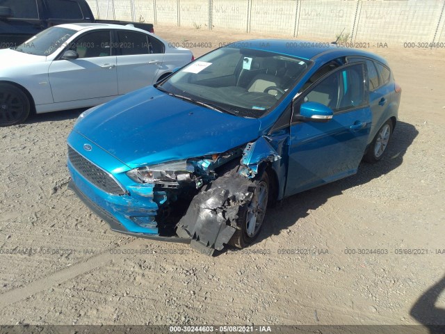 Photo 1 VIN: 1FADP3K2XGL380315 - FORD FOCUS 