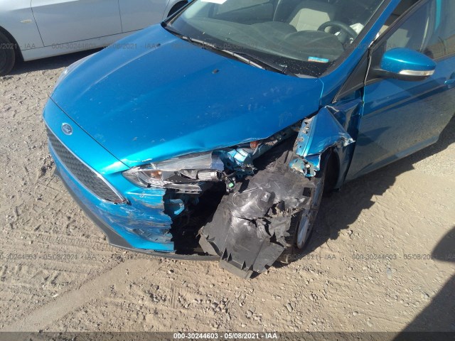 Photo 5 VIN: 1FADP3K2XGL380315 - FORD FOCUS 