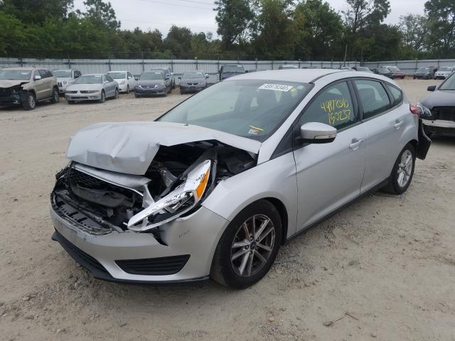 Photo 1 VIN: 1FADP3K2XGL382243 - FORD FOCUS SE 