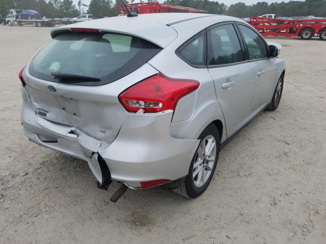 Photo 3 VIN: 1FADP3K2XGL382243 - FORD FOCUS SE 