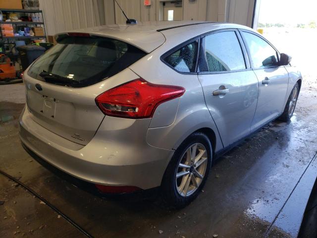 Photo 3 VIN: 1FADP3K2XGL382419 - FORD FOCUS SE 