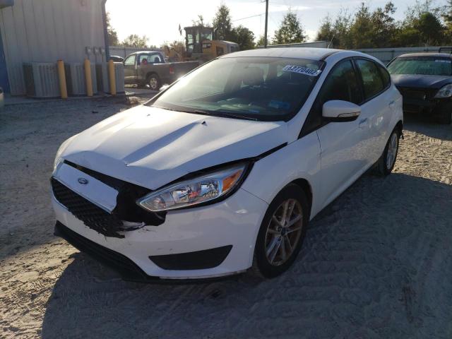 Photo 1 VIN: 1FADP3K2XJL201035 - FORD FOCUS SE 