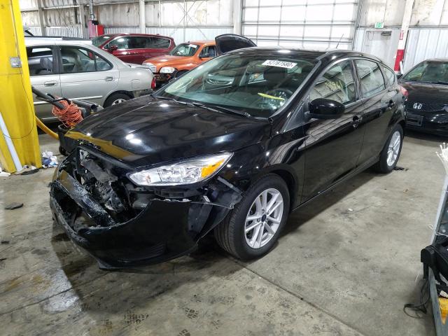 Photo 1 VIN: 1FADP3K2XJL224895 - FORD FOCUS SE 