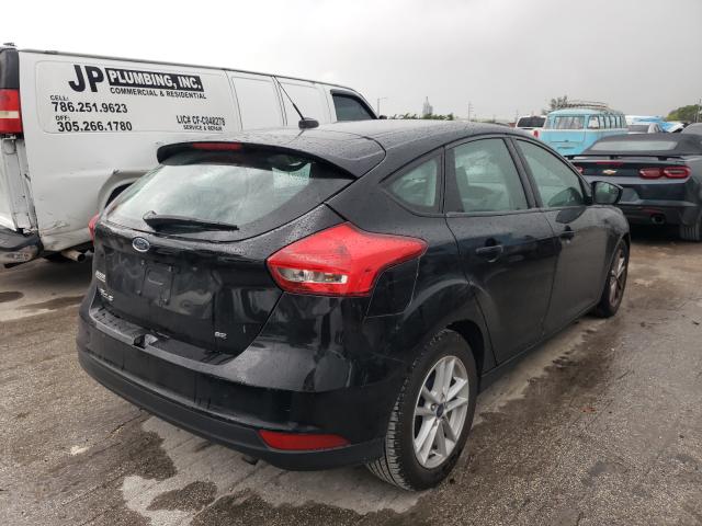 Photo 3 VIN: 1FADP3K2XJL231491 - FORD FOCUS SE 