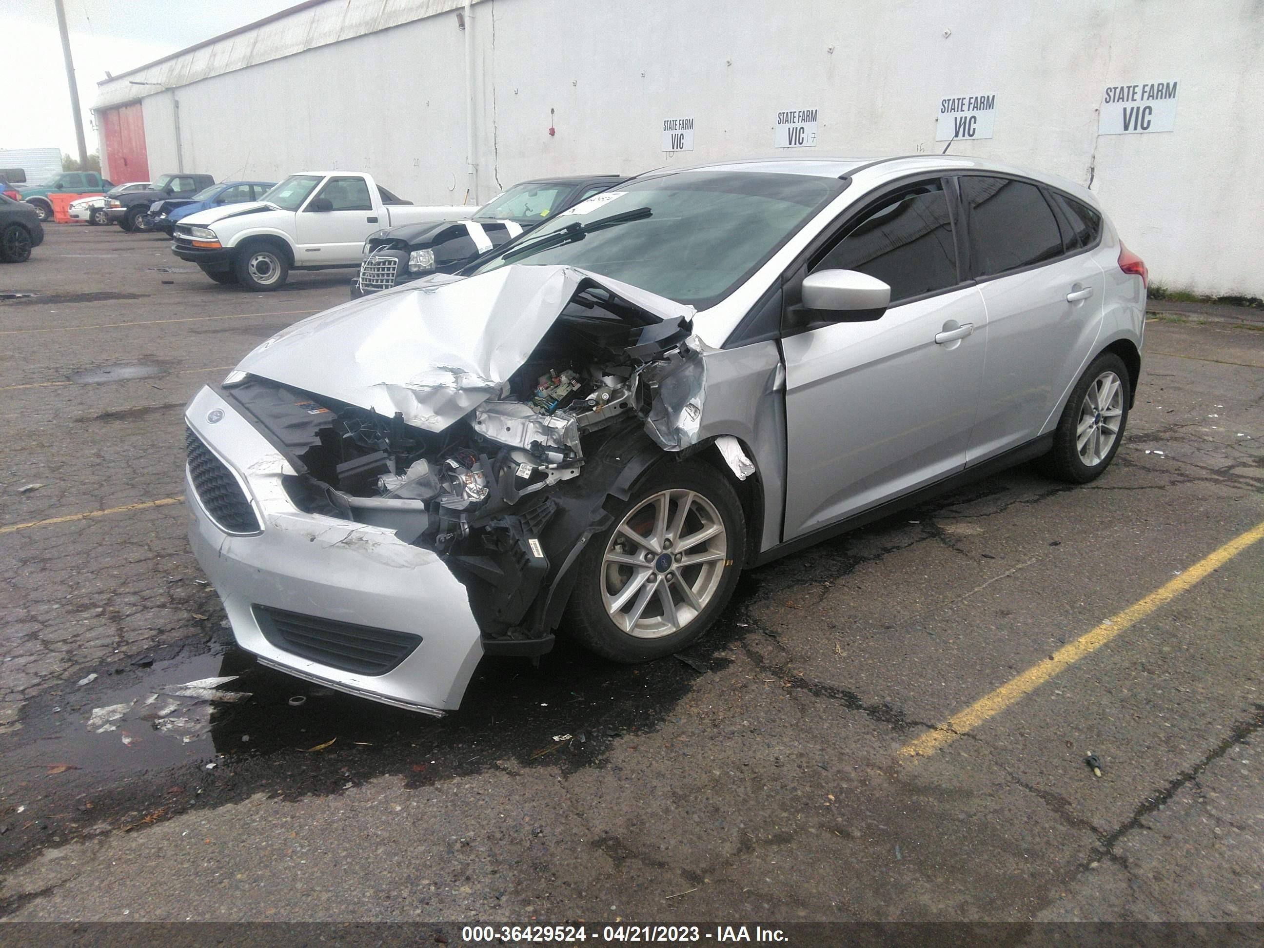 Photo 1 VIN: 1FADP3K2XJL241485 - FORD FOCUS 