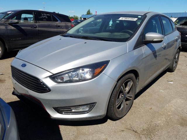 Photo 1 VIN: 1FADP3KE7GL281428 - FORD FOCUS SE 