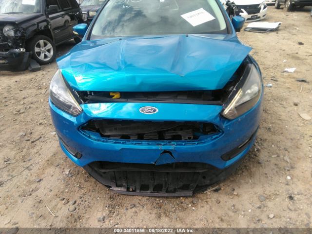 Photo 5 VIN: 1FADP3KE7GL371310 - FORD FOCUS 