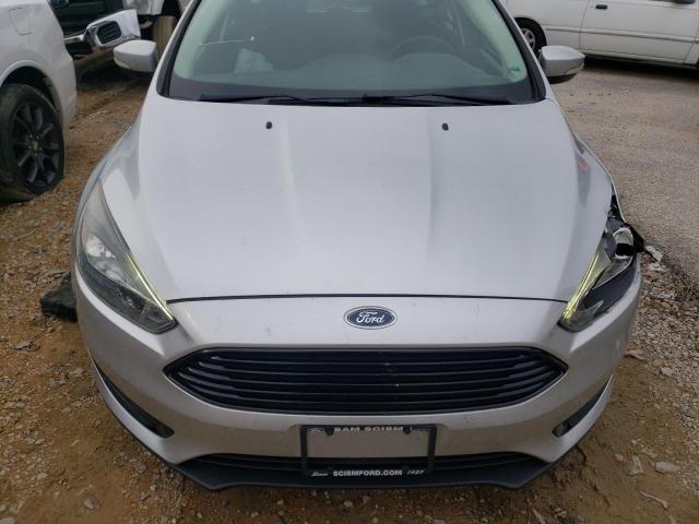 Photo 4 VIN: 1FADP3KEXGL301218 - FORD FOCUS SE 