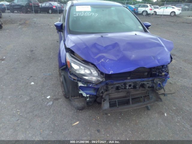 Photo 5 VIN: 1FADP3L90EL340902 - FORD FOCUS 