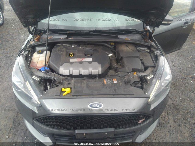 Photo 9 VIN: 1FADP3L90JL275754 - FORD FOCUS 