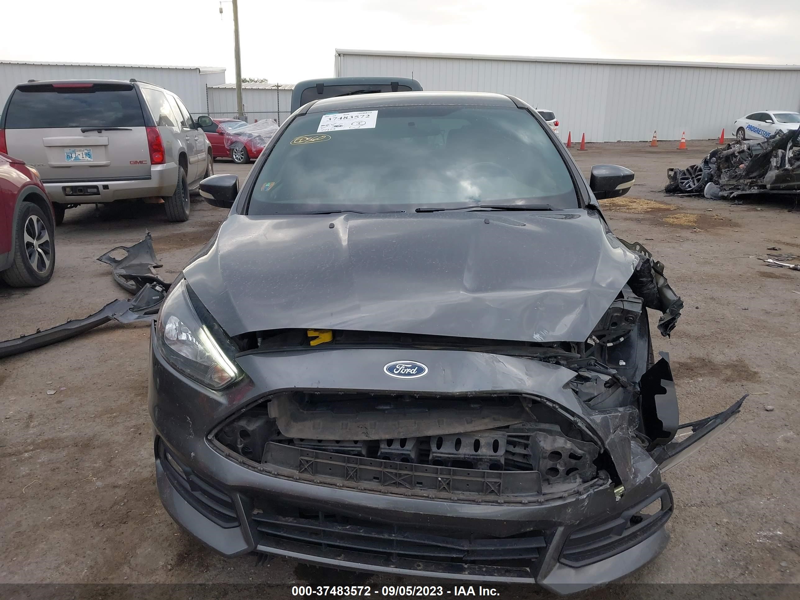 Photo 12 VIN: 1FADP3L92JL269244 - FORD FOCUS 