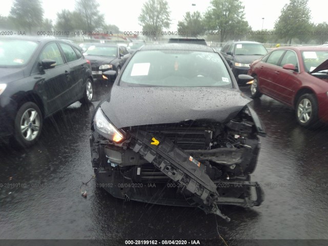 Photo 5 VIN: 1FADP3L93HL335522 - FORD FOCUS 