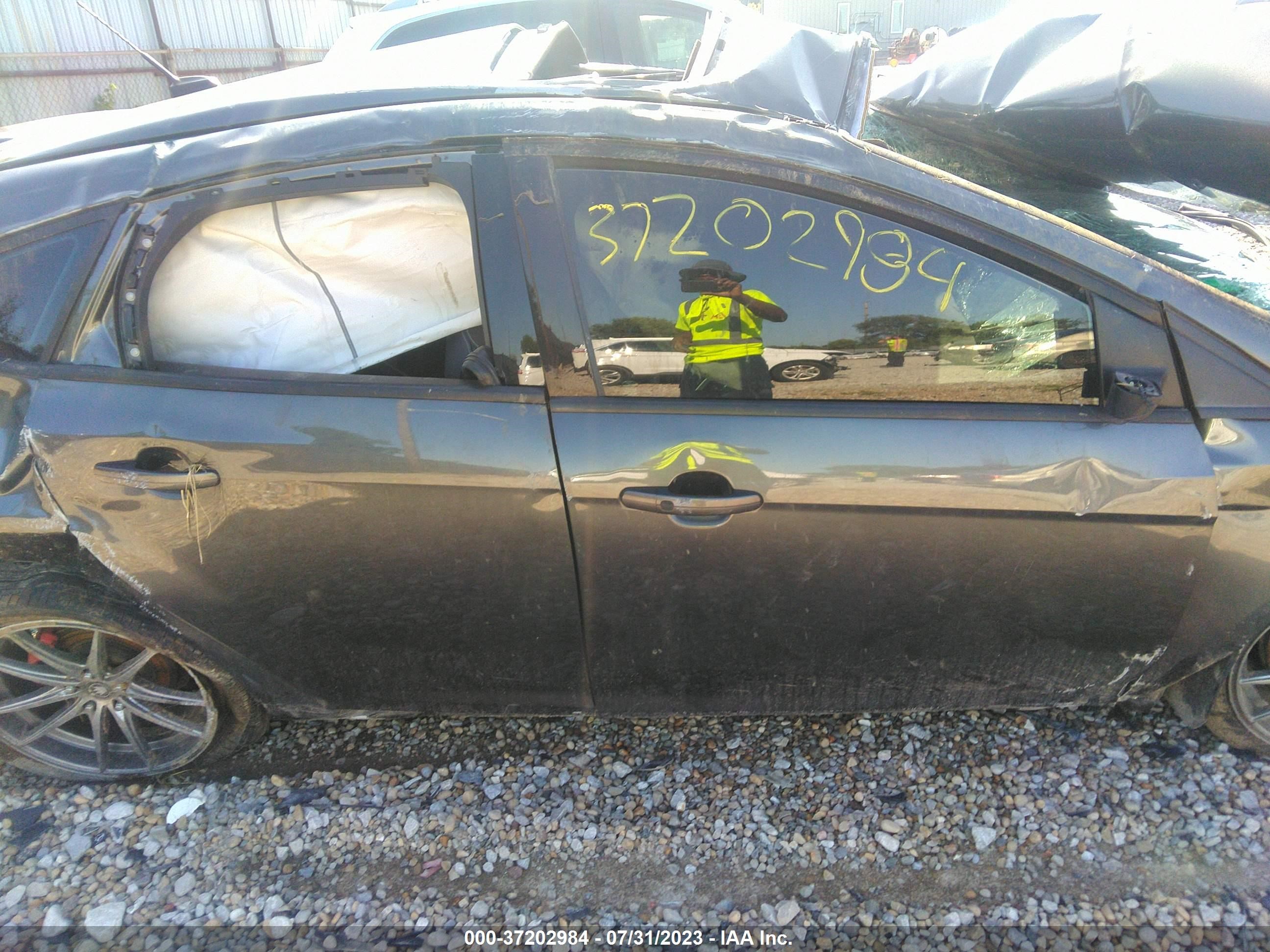 Photo 12 VIN: 1FADP3L93JL289129 - FORD FOCUS 