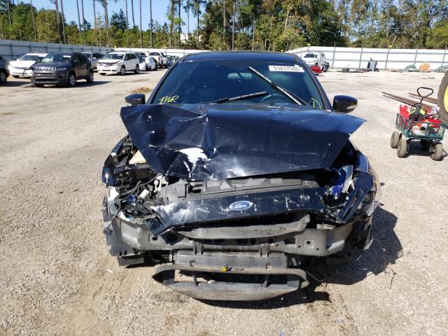 Photo 8 VIN: 1FADP3L94JL238366 - FORD FOCUS 