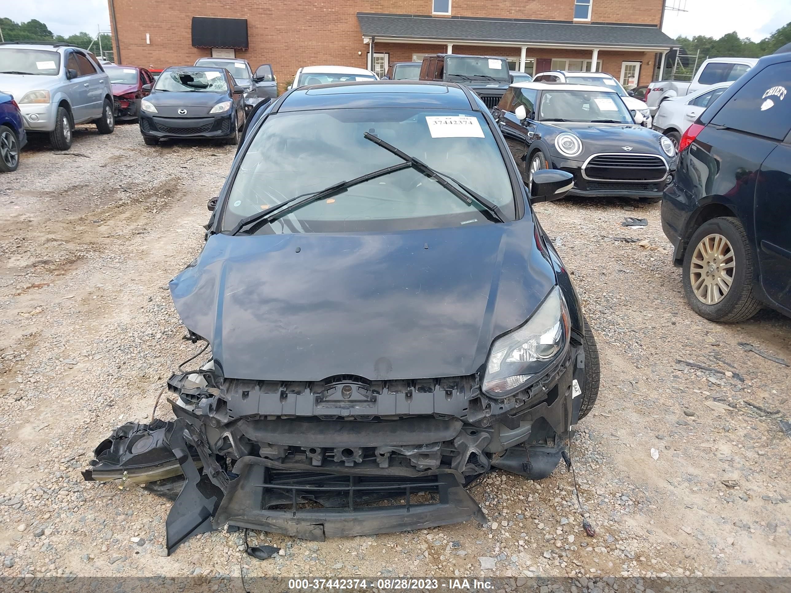 Photo 11 VIN: 1FADP3L95EL338711 - FORD FOCUS 