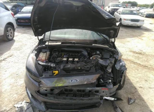 Photo 9 VIN: 1FADP3L96HL307987 - FORD FOCUS 