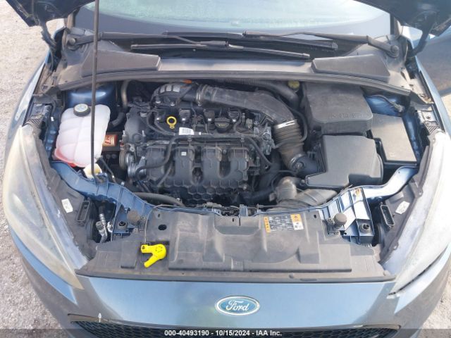 Photo 9 VIN: 1FADP3L98JL201658 - FORD FOCUS 