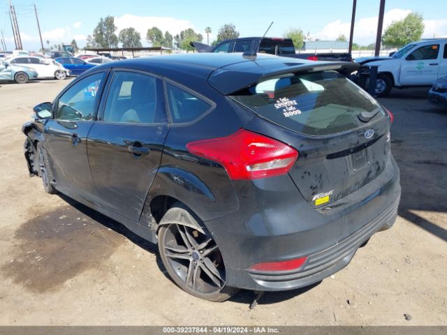 Photo 2 VIN: 1FADP3L9XJL323227 - FORD FOCUS 