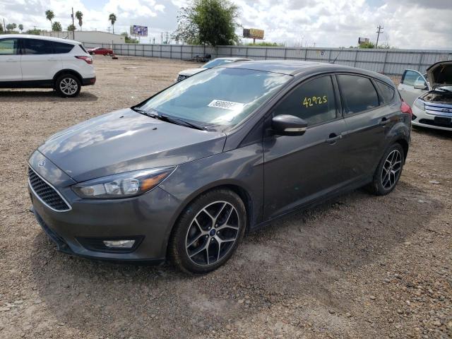 Photo 1 VIN: 1FADP3M20JL216771 - FORD FOCUS SEL 