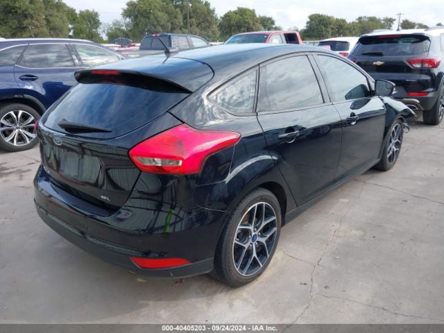 Photo 3 VIN: 1FADP3M20JL322069 - FORD FOCUS 