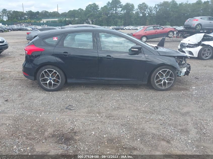 Photo 12 VIN: 1FADP3M21HL335553 - FORD FOCUS 