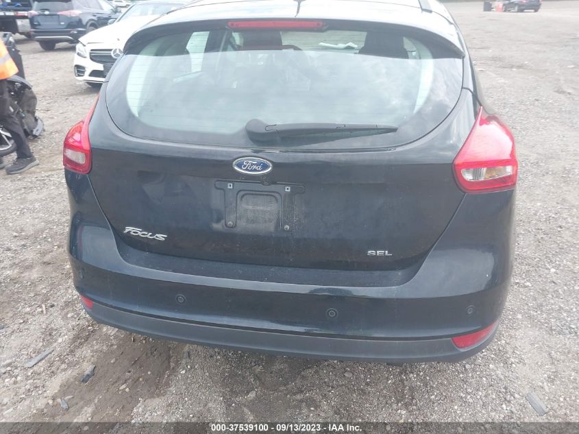 Photo 15 VIN: 1FADP3M21HL335553 - FORD FOCUS 