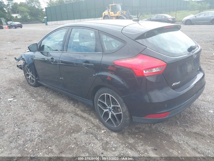 Photo 2 VIN: 1FADP3M21HL335553 - FORD FOCUS 