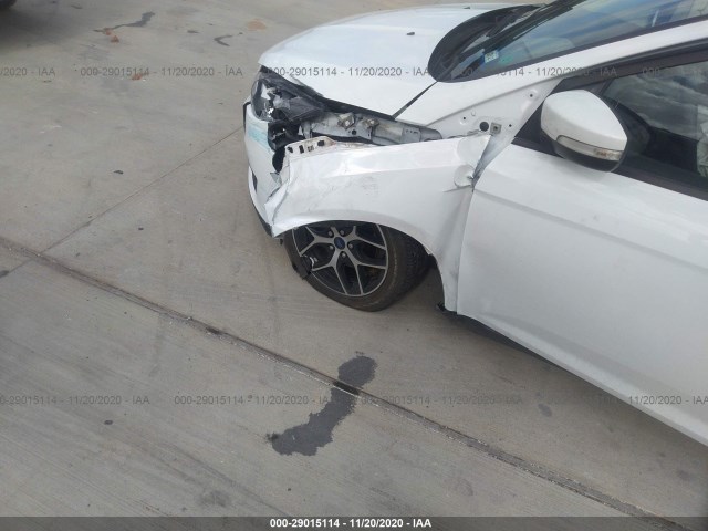 Photo 5 VIN: 1FADP3M21JL240156 - FORD FOCUS 