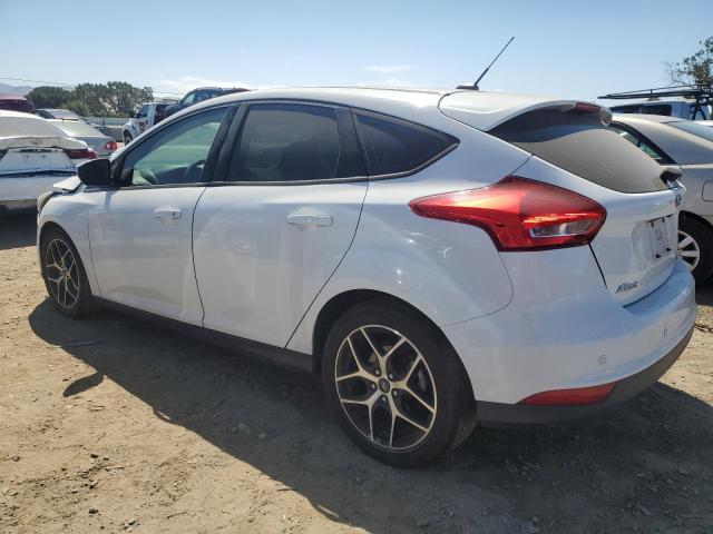 Photo 1 VIN: 1FADP3M22HL304053 - FORD FOCUS 