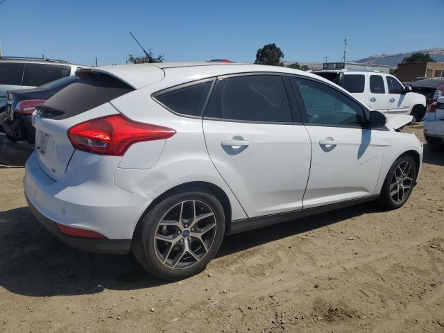 Photo 2 VIN: 1FADP3M22HL304053 - FORD FOCUS 