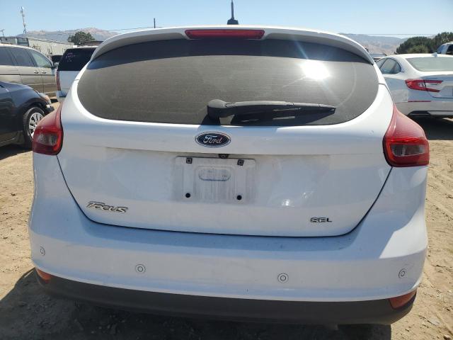 Photo 5 VIN: 1FADP3M22HL304053 - FORD FOCUS 