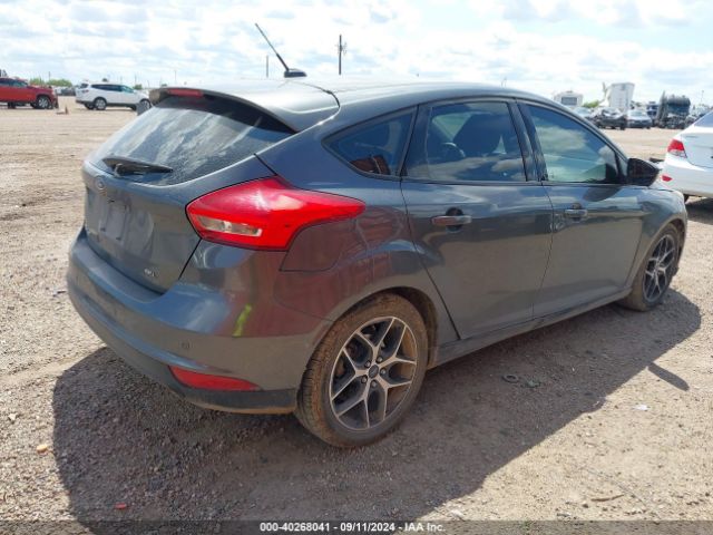 Photo 3 VIN: 1FADP3M23HL200994 - FORD FOCUS 