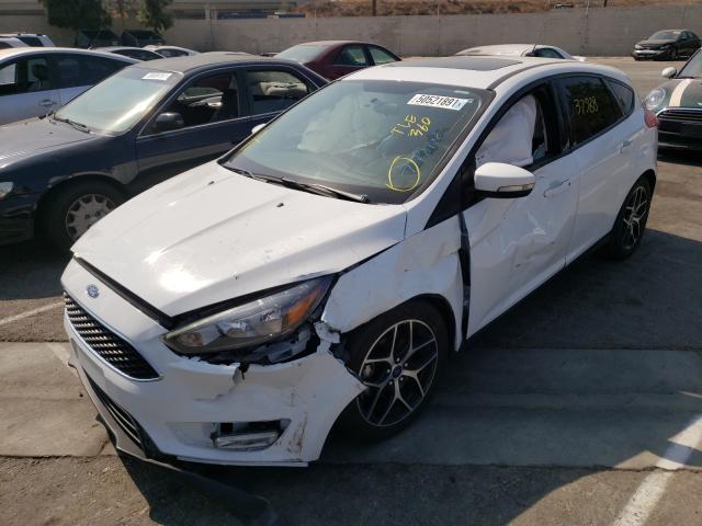 Photo 1 VIN: 1FADP3M23JL205053 - FORD FOCUS SEL 