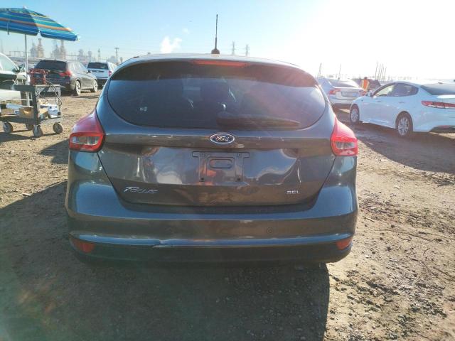 Photo 5 VIN: 1FADP3M23JL249635 - FORD FOCUS 