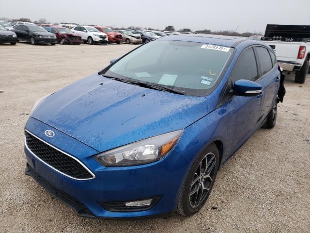 Photo 1 VIN: 1FADP3M23JL311499 - FORD FOCUS 