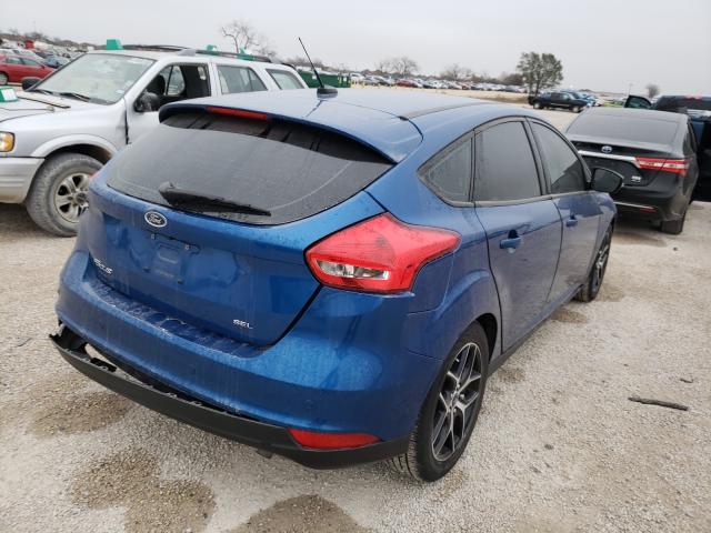 Photo 3 VIN: 1FADP3M23JL311499 - FORD FOCUS 