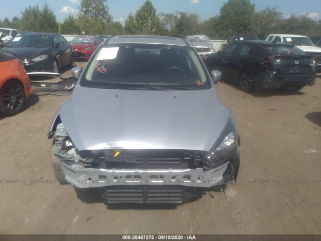 Photo 5 VIN: 1FADP3M24HL226133 - FORD FOCUS 