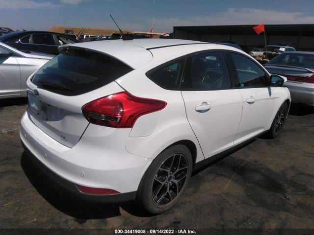 Photo 3 VIN: 1FADP3M24HL314776 - FORD FOCUS 