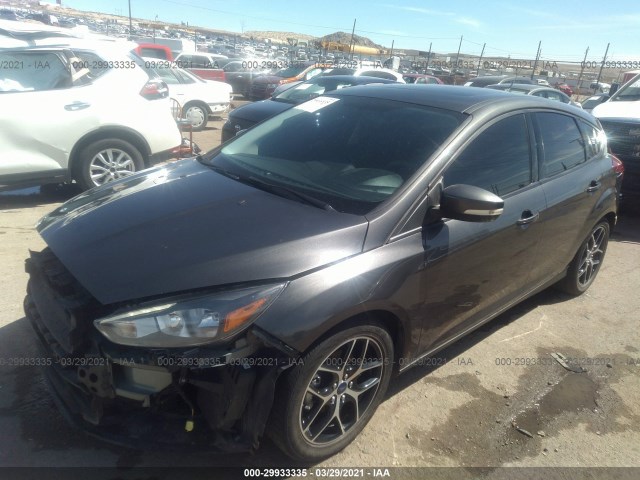 Photo 1 VIN: 1FADP3M24JL230270 - FORD FOCUS 