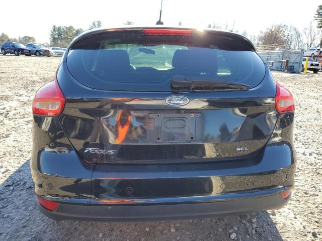 Photo 5 VIN: 1FADP3M25HL311191 - FORD FOCUS 