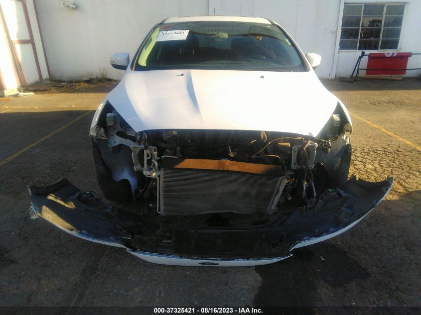 Photo 12 VIN: 1FADP3M25JL241357 - FORD FOCUS 