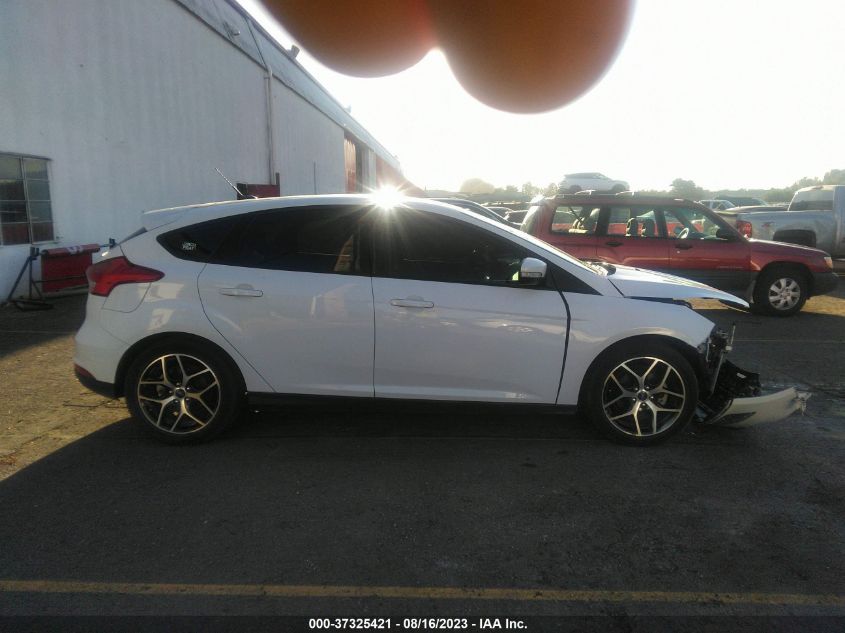 Photo 13 VIN: 1FADP3M25JL241357 - FORD FOCUS 