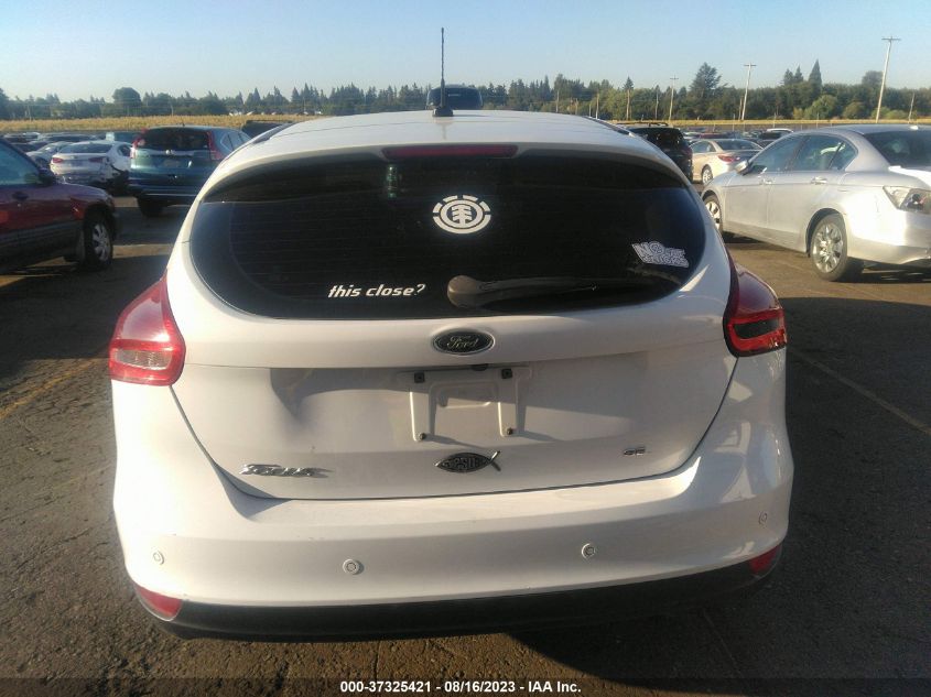 Photo 16 VIN: 1FADP3M25JL241357 - FORD FOCUS 