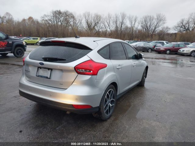 Photo 3 VIN: 1FADP3M25JL250074 - FORD FOCUS 