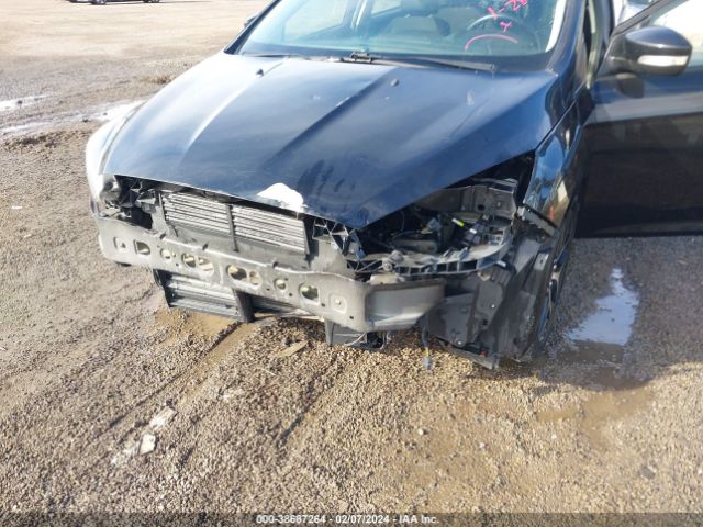 Photo 5 VIN: 1FADP3M25JL276531 - FORD FOCUS 