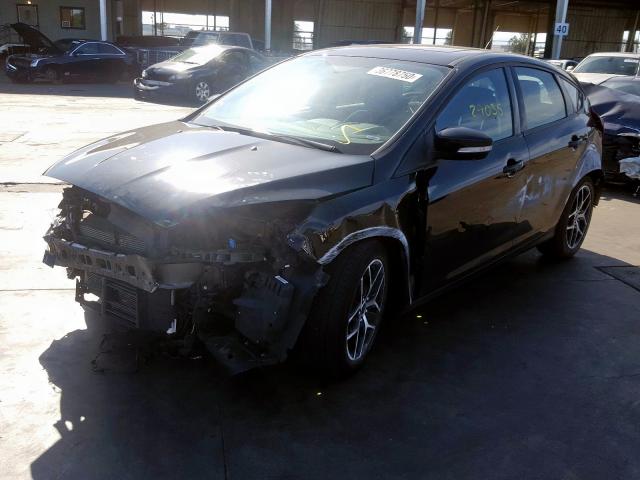 Photo 1 VIN: 1FADP3M25JL277128 - FORD FOCUS 