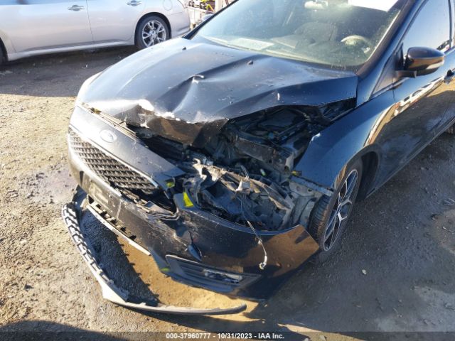 Photo 5 VIN: 1FADP3M26HL332695 - FORD FOCUS 