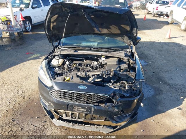 Photo 9 VIN: 1FADP3M26HL332695 - FORD FOCUS 